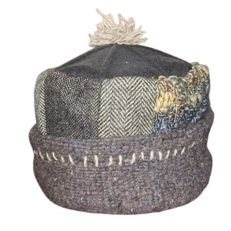 Textured beanie with patterned sections on a white background