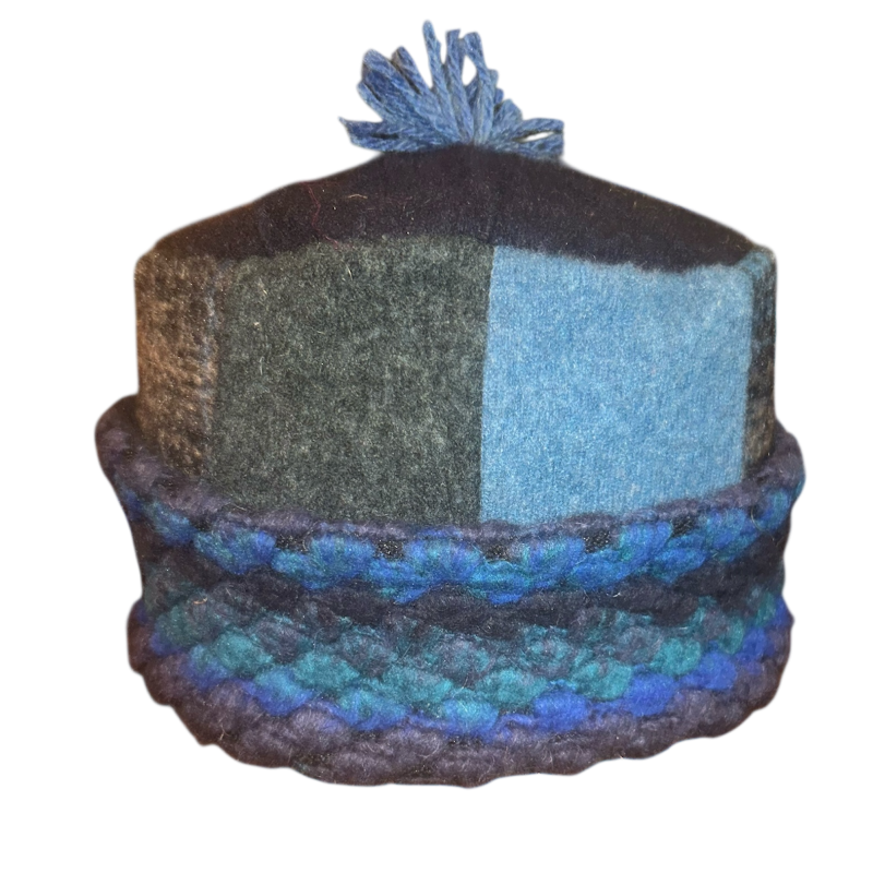 Multicolored knit hat with textured pattern on a white background